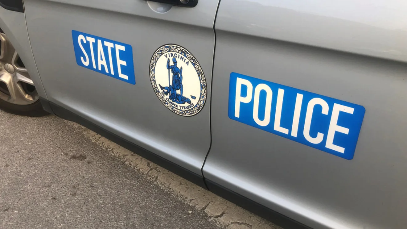 Police investigate a fatal crash near an intersection in Lee County, Virginia